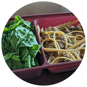 Healthy noodles, beef, and spinach